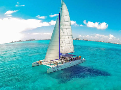 CATAMARÁN A ISLA MUJERES PLUS CON TRANS. REDONDA MEXICO